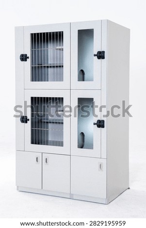 Light gray wall-mounted lockable laboratory storage cabinet against a pure white background