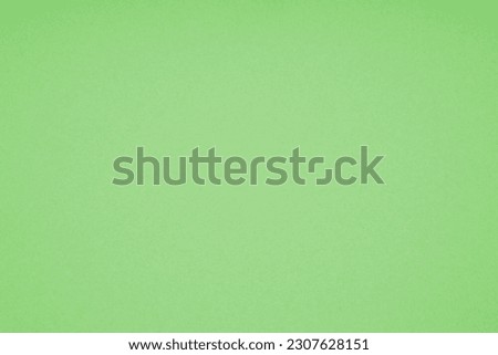 light green paperboard background with paper texture