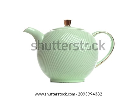 light green porcelain teapot for making tea on a white background