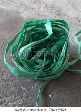 light green raffia rope object