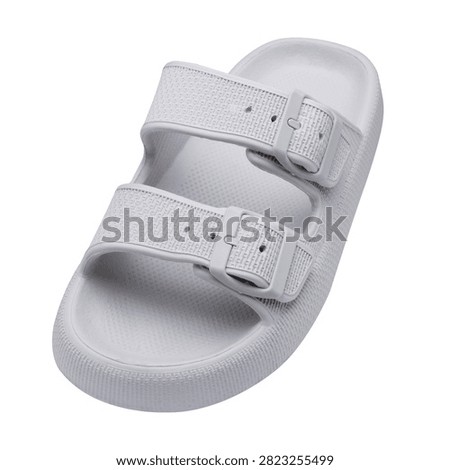 Light grey double strap platform slides isolated on white background. Double buckle foam sandals, high angle view.