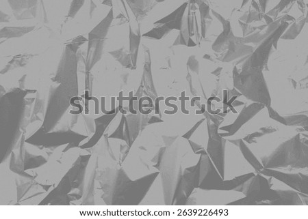 Light grey foil metal background. Seamless texture of old crumpled paper. Sculptural folds. Trendy Pinterest-style aesthetics. Minimalist design.  Retro vintage noisy grainy monochrome structure. 