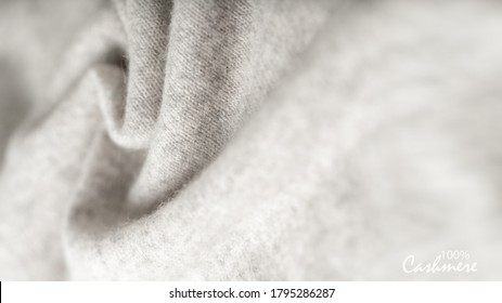 Light grey luxury pure cashmere texture. Blurred background with copy space