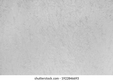 Light grey wall texture with abstract pattern of white background.