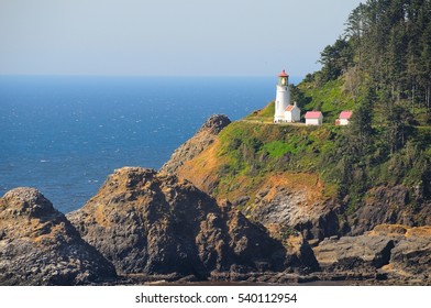 Light House Along Oregon Coast On Cliff