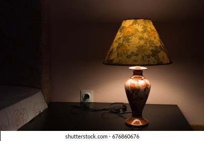 Light Of A Lamp On The Night Stand In The Evening