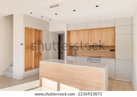Similar – Image, Stock Photo Bright modern kitchen with wooden floor and white cabinets