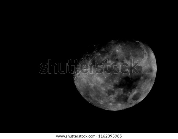 The light of the\
moon is bright at night, shining on the earth as the natural\
universe of the solar\
system.