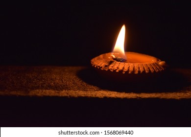 The light of the night candles in the light brown rice lamp used on holy days, important religious days and traditions, showing the spirit of Thai people in the north - Powered by Shutterstock