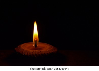 The light of the night candles in the light brown rice lamp used on holy days, important religious days and traditions, showing the spirit of Thai people in the north - Powered by Shutterstock