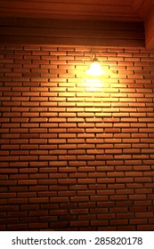Light on brick wall 