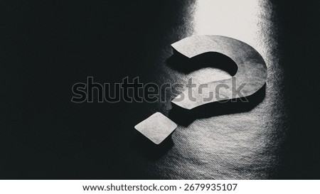 Light on Question mark on dark background. Concept about Problem solving, solutions, creativity, and the search for answers in business and strategy.