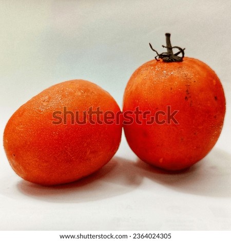 A light orange tomato is a delightful and visually appealing fruit that boasts a unique and enticing appearance. Its vibrant and gentle hue falls somewhere between pale peach and soft tangerine, creat
