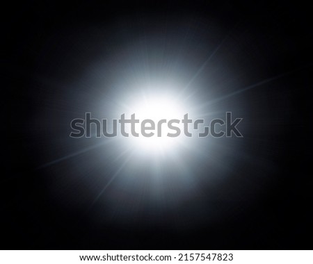 Light overlay effect. Easy to add lens flare effects for overlay designs or screen blending mode to make high-quality images. Abstract sun burst, digital flare, iridescent glare over black background.