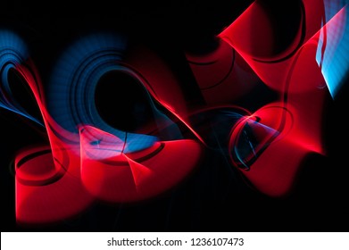 Light painting abstract background. Blue and red light painting photography, long exposure, ripples and swirl against a black background. - Powered by Shutterstock