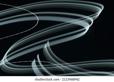 Light Painting Concept.Hand Movement Of Light Source.Unique  Shapes And Beautiful Look.Creative Abstract Content Image.