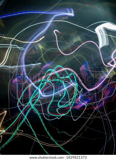 Light painting created through various light sources \
residents vehicles headlight to brake light and street lamp and\
police light and  historical place lighting colorful vehicle \
ambulance crane 