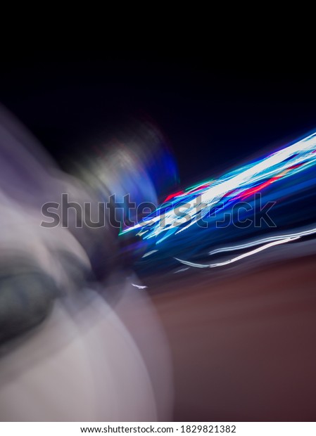 Light painting created through various light sources \
residents vehicles headlight to brake light and street lamp and\
police light and  historical place lighting colorful vehicle \
ambulance crane 