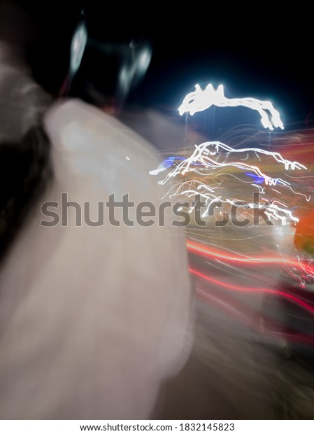 Light painting created through various light sources \
residents vehicles headlight to brake light street lamp  police\
light and  historical place lighting colorful vehicle  ambulance\
slow shutter 