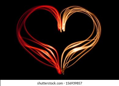 Light Painting Heart Shape Over Black Background