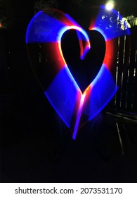 Light Painting Heart Shaped In Red And Blue