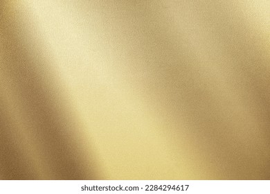 Light pale brown yellow silk satin. Gradient. Dusty gold color. Golden luxury elegant abstract background. Shiny, shimmer. Curtain. Drapery. Fabric, cloth texture. Christmas, birthday.