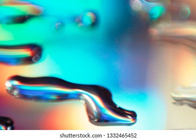 Light Pass Through Glass Surface With Droplets Causing Diffraction And Interference 
Effect. Concept Of Electro-magnetic Wave Energy, Spectrum.