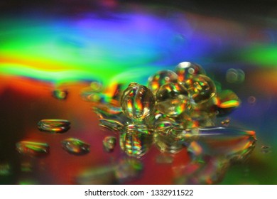 Light Pass Through Glass Surface With Droplets Causing Diffraction And Interference 
Effect. Concept Of Electro-magnetic Wave Energy, Spectrum.