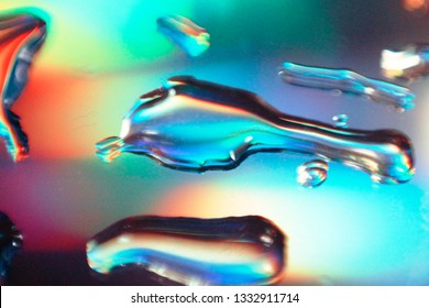 Light Pass Through Glass Surface With Droplets Causing Diffraction And Interference 
Effect. Concept Of Electro-magnetic Wave Energy, Spectrum.