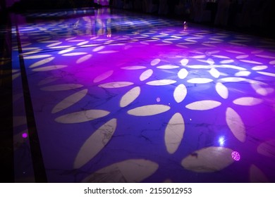 Light Pattern On A Dark Dance Floor Created By Professional Lighting Equipment.