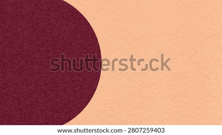 Light peach paper texture background with dark wine semicircle and copy space for banner, presentation, template.