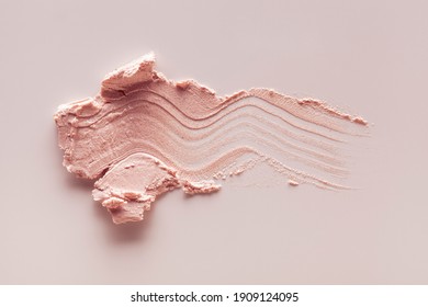 Light Pink Beige Makeup Smear Of Creamy Luminous Blusher Isolated On Pink Background