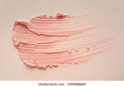 Light Pink Beige Makeup Smear Of Creamy Luminous Blusher Isolated On Beige Background