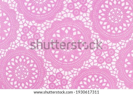 Light pink openwork on a white background