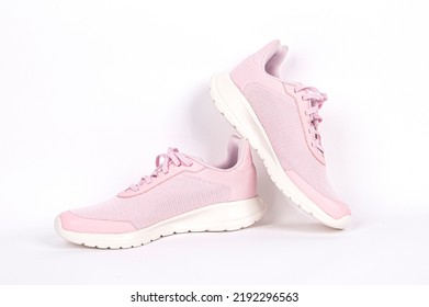 Light Pink Running Sports Shoe On White Background. Running Shoe, Sneaker Or Trainer. Women's Athletic Shoe. Fitness, Sport, Training Concept.
Outdoor Sports Clothing And Shoes, Urban Style.