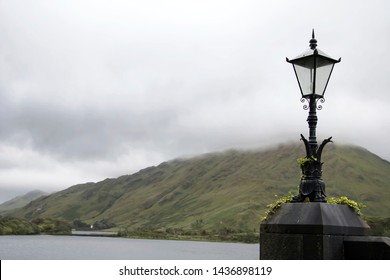 Light Post View Of Ireland Rolling Hills.