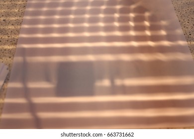 The Light Projections Of A Ripple Tank On A Piece Of Paper.  Waves Seen To Reflect At A 90 Degree Angle.