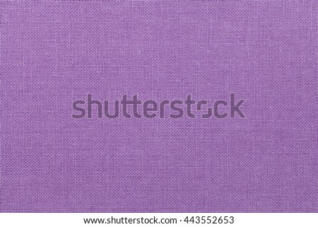 light purple background from a textile material. Fabric with natural texture. Cloth backdrop.
