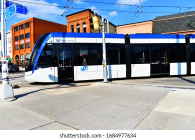 Light Rail Train, LRT Form Grand River Transit, GRT,  ION Crossing The Street Uptown Waterloo To Waterloo Public Square Station In Waterloo, Ontario Canada March 25, 2020 