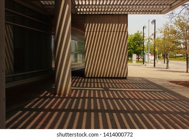 Light rays creating graphic pattern on wall and floor