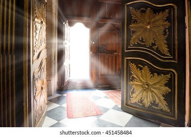 Light Rays From The Old Wooden Door. Concept Interior Of Dark Room