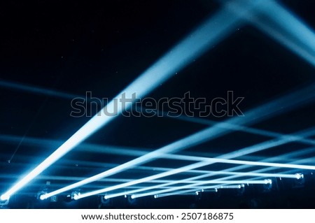 light rays of light on black background. abstract background. glowing laser rays moving with black background.