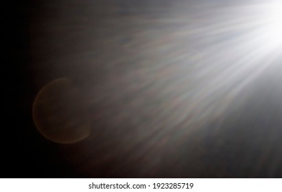 Light rays over dark gradient background. Also can be used as an Overlay with a Blending Mode (screen).
