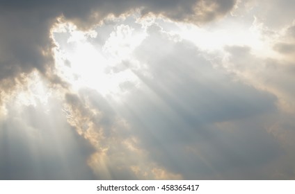 Light Rays Shine Through Dark Clouds