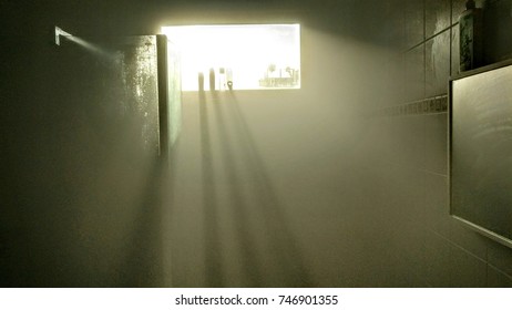 Light Rays From Sunrise After A Steamy Shower