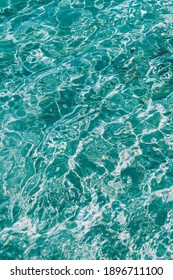 light reflecting clear sea water Background.