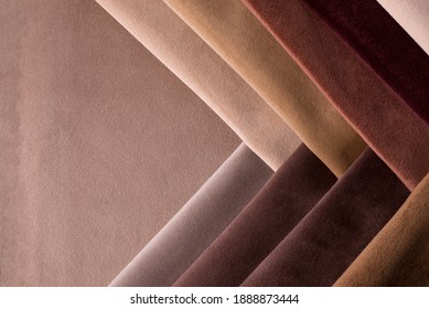 Light Set Sail Champagne and chocolate colors velour textile samples. Fabric texture background