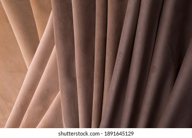 Light Set Sail Champagne and chocolate colors velour textile samples. Fabric texture background