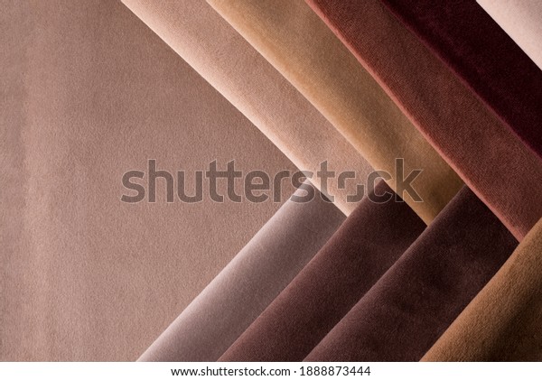 Light Set Sail Champagne and\
chocolate colors velour textile samples. Fabric texture\
background