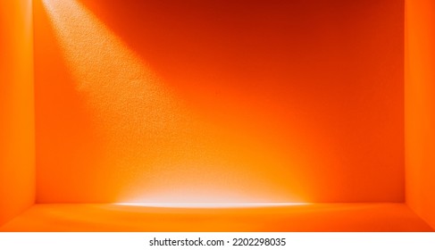 Light and shadow in the background of a orange interior black with open space
